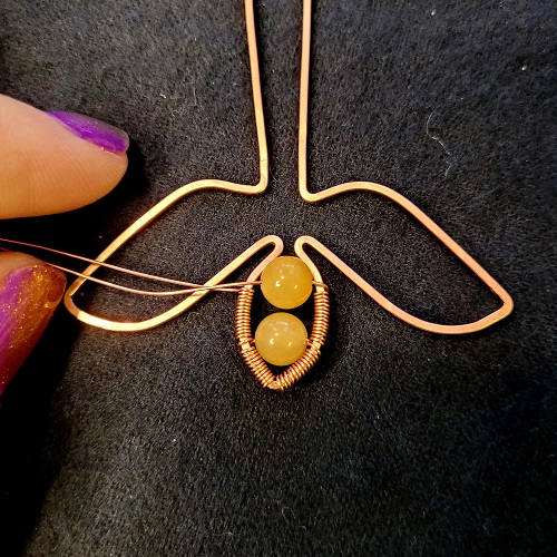 Jennifer Brooks's Rosy Maple Moth Pendant - , Contemporary Wire Jewelry, Lashing, Wire Lashing, Wire Wrapping, Wrapping, Wire Wrapping Jewelry, Push both wrapping ends to the back again